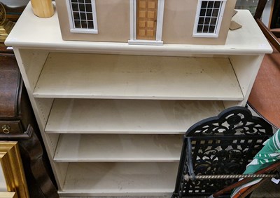 Lot 822 - A 20th century white painted bookshelf with...