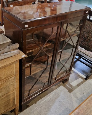 Lot 828 - A 20th century mahogany bookcase in the...