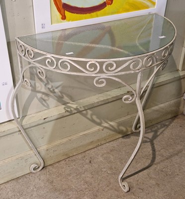 Lot 881 - A white painted metal demi lune console table,...