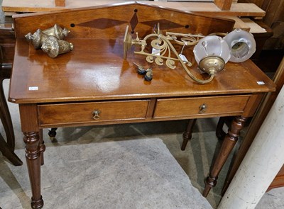 Lot 869 - A 19th century mahogany side table with shaped...