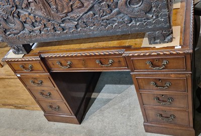 Lot 878 - A 20th century mahogany twin-pedestal desk...