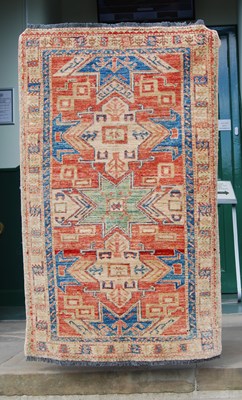 Lot 906 - A 20th century Persian style rug, the...