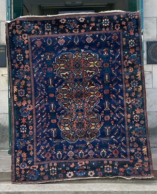 Lot 907 - A Persian rug, 20th century, the rectangular...