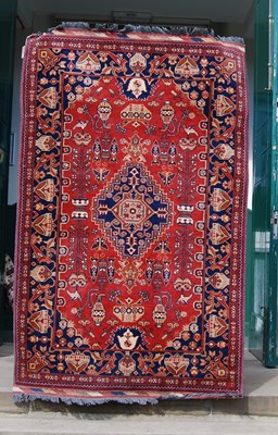 Lot 917 - A 20th century Persian rug, the rectangular...