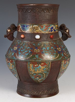 Lot 534 - A Chinese bronze and champleve enamel archaic...