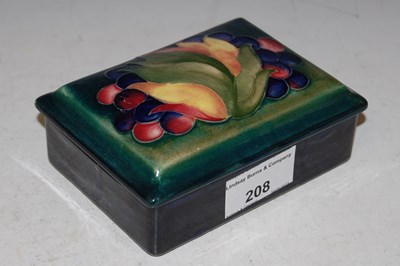 Lot 208 - A Moorcroft pottery green ground rectangular...