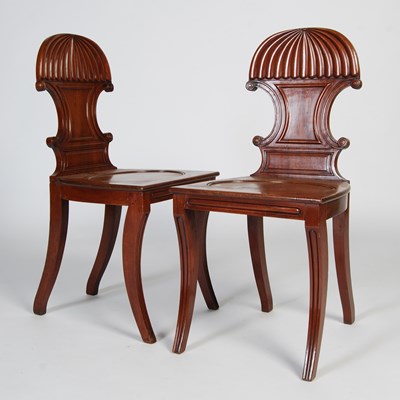 Lot 51 - A pair of 19th century mahogany hall chairs,...