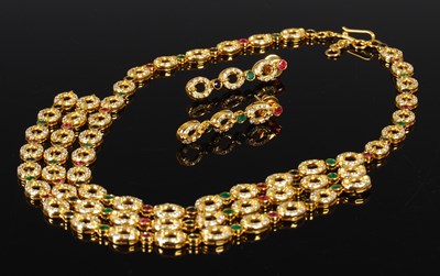 Lot 460 - A yellow metal, diamond, emerald, ruby and...