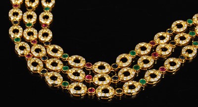 Lot 460 - A yellow metal, diamond, emerald, ruby and...