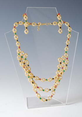 Lot 460 - A yellow metal, diamond, emerald, ruby and...