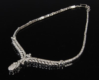 Lot 459 - A white metal and diamond set Y-shaped...