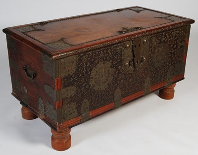 Lot 11 - A 19th century teak Zanzibar chest, the hinged...