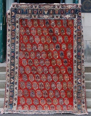 Lot 143 - A Persian rug, 20th century, the abrash...