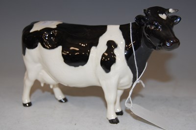 Lot 216 - A Beswick model of a cow, 'Champion Claybury...