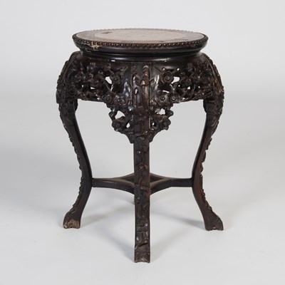 Lot 14 - A Chinese darkwood urn stand, late Qing...