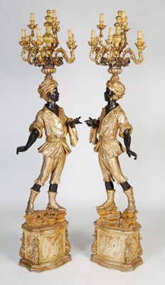 Lot 54 - A pair of blackamoor figural floor standing...