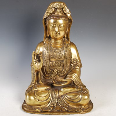 Lot 550 - A large Chinese gilt bronze figure of Guanyin,...