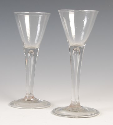 Lot 25 - Two similar 18th century wine glasses, each...