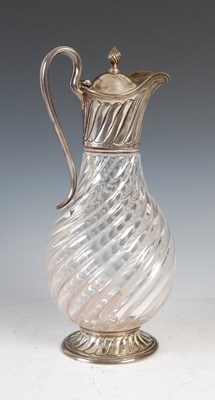 Lot 353 - A Victorian silver mounted glass claret jug,...