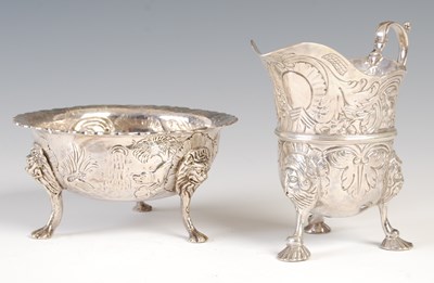 Lot 343 - A George III Irish silver cream jug and sugar...