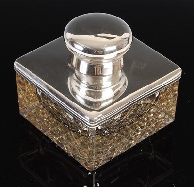 Lot 323 - An Edwardian silver mounted glass inkwell,...