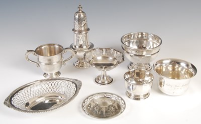 Lot 365 - A collection of silver, to include sugar...