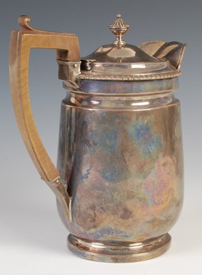 Lot 363 - A George III silver hot water pot, London,...