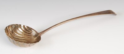 Lot 336 - An Irish George III silver soup ladle, Dublin,...