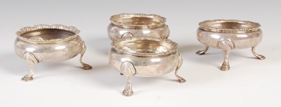 Lot 316 - A set of four George III silver salts, marked...