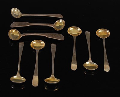 Lot 309 - A rare set of six George III silver gilt salt/...