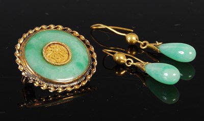 Lot 387 - A yellow metal mounted jade brooch and pair of...