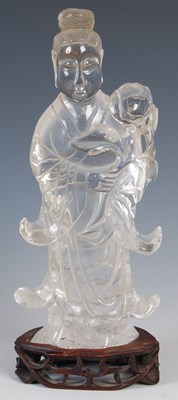 Lot 547 - A Chinese rock crystal figure of Guanyin, Qing...