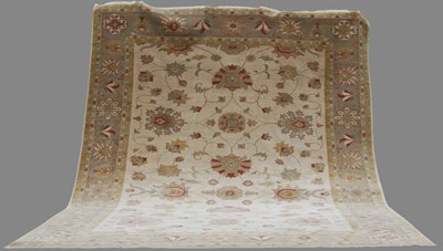 Lot 146 - A large Persian carpet, 20th century, the café...