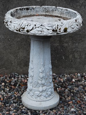 Lot 111 - A composite stone garden bird bath, 20th...