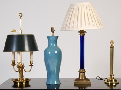 Lot 163 - Four assorted table lamps, to include a brass...