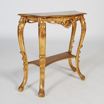 Lot 38 - A Rococo style giltwood console table of small...