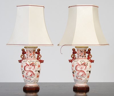 Lot 165 - A pair of English pottery table lamps and...