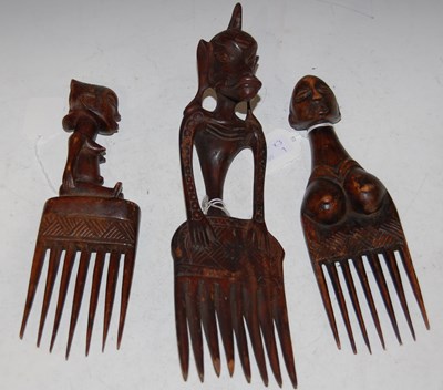 Lot 227 - Tribal Art: three vintage figural carved wood...