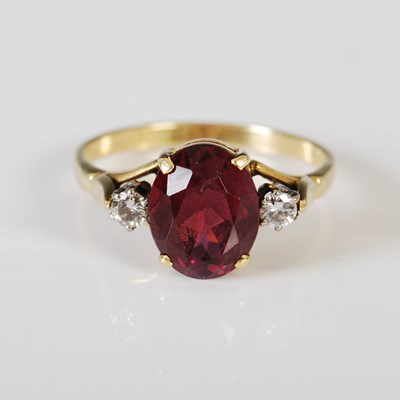 Lot 421 - A yellow metal rhodolite garnet and diamond...