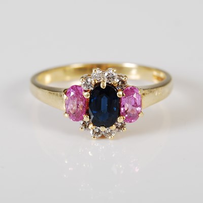 Lot 432 - An 18ct gold pink and blue sapphire and...