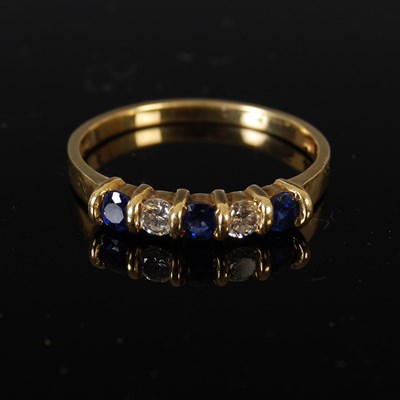 Lot 420 - An 18ct gold sapphire and diamond five stone...