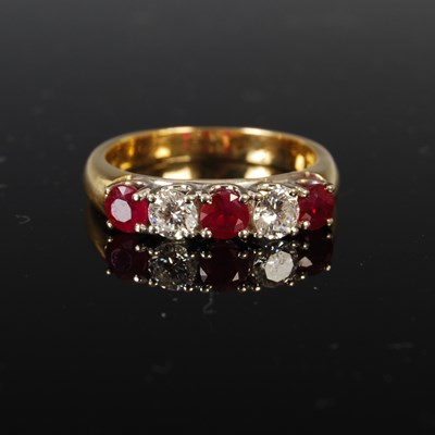 Lot 449 - An 18ct gold ruby and diamond five stone ring,...