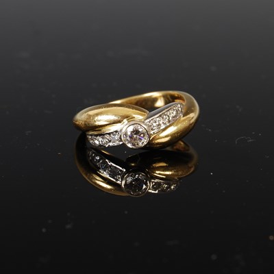 Lot 431 - An 18ct yellow and white gold diamond ring,...