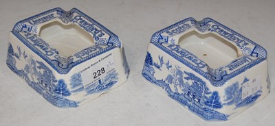 Lot 228 - Advertising interest: a pair of blue printed...