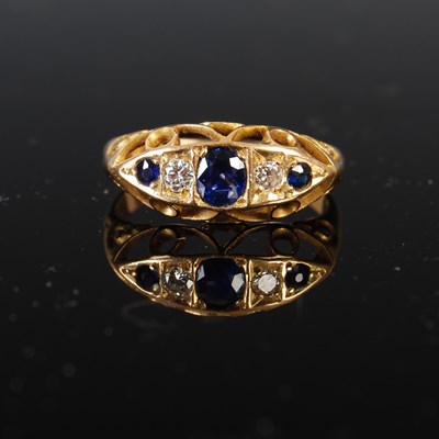 Lot 419 - An 18ct gold sapphire and diamond ring, set...