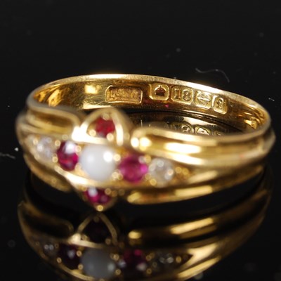 Lot 391 - An 18ct gold white opal, ruby and diamond ring,...