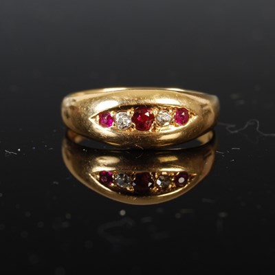 Lot 392 - An 18ct gold ruby and diamond five stone ring,...