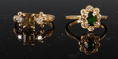 Lot 434 - Two gold gem set dress rings, comprising an...