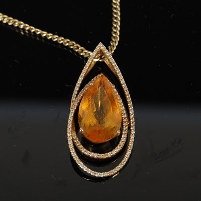 Lot 412 - An 18ct gold pear-shaped citrine and diamond...