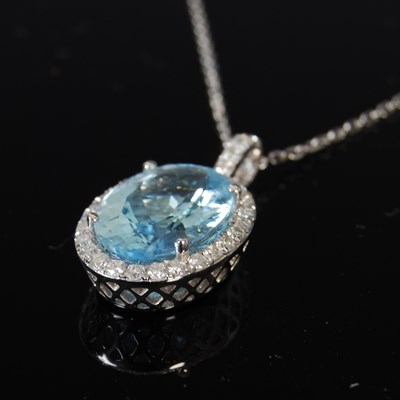 Lot 445 - An 18ct white gold aquamarine and diamond...